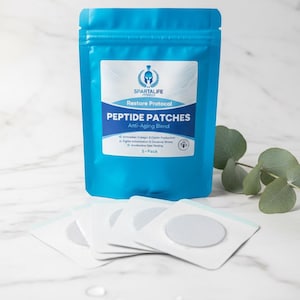 May include: A blue pouch of "SPARTALIFE" peptide patches with the text "Restore Protocol" and "Anti-Aging Blend". Several individual patches are displayed in front of the pouch. The package contains 5 patches.