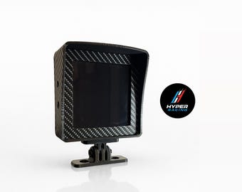 May include: A black racing display with a carbon fiber finish and a black screen. The display is mounted on a black bracket and features the "HYPER RACING" logo in a circle.