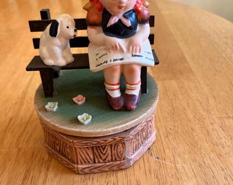 Vintage musical figurine spins and plays