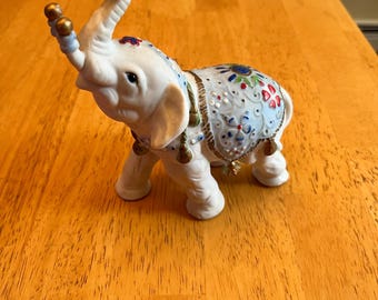 Vintage Porcelain Elephant Figurine: Ornate Decorative Accent