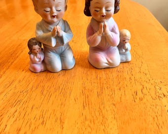 Vintage praying boy and girl
