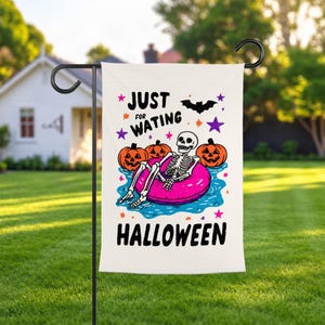 May include: A rectangular garden flag featuring a white background with a graphic of a skeleton lounging in a bright pink pool float surrounded by orange jack-o'-lanterns and blue water. The text reads JUST FOR WATING HALLOWEEN with stars and a bat.