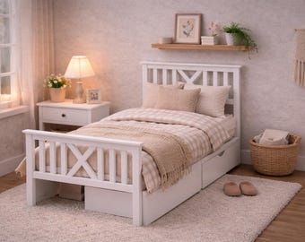 May include: A white wooden twin bed frame featuring a headboard and footboard with a cross-brace design. The bed includes two integrated storage drawers underneath and is dressed with a beige and white checkered duvet and a textured throw blanket.