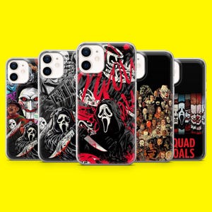 May include: A collection of five phone cases with horror-themed designs. The cases feature images of iconic horror movie characters, including a masked figure with a knife, a clown, and other scary figures. The cases are on a yellow background.