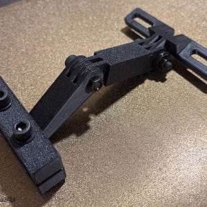 This image displays a highly detailed 3D model of a Rear Bike Light Mount designed for a bicycle seat post. The digital rendering shows a sleek, aerodynamic Cycling Accessory with a secure Bicycle Bracket attachment, emphasizing precision Blender Modeling and high-quality 3D Printing design for night safety.