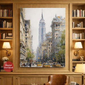 May include: A watercolor painting of a New York City street scene, featuring the Empire State Building. The artwork depicts buildings, yellow taxis, and pedestrians. The painting is displayed on a wall with a digital download label.