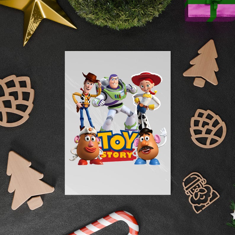May include: A white poster featuring the Toy Story characters Woody, Buzz Lightyear, Jessie, and Mr. and Mrs. Potato Head. The Toy Story logo is in the center. The poster is surrounded by Christmas decorations.
