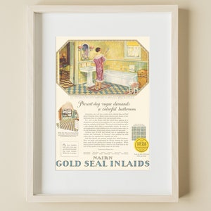 May include: A vintage advertisement for Nairn Gold Seal Inlaid linoleum flooring. The ad features a woman in a pink dress standing in a bathroom with yellow and white tiled walls and a checkered black and white floor. The text reads "Present day vogue demands a colorful bathroom".