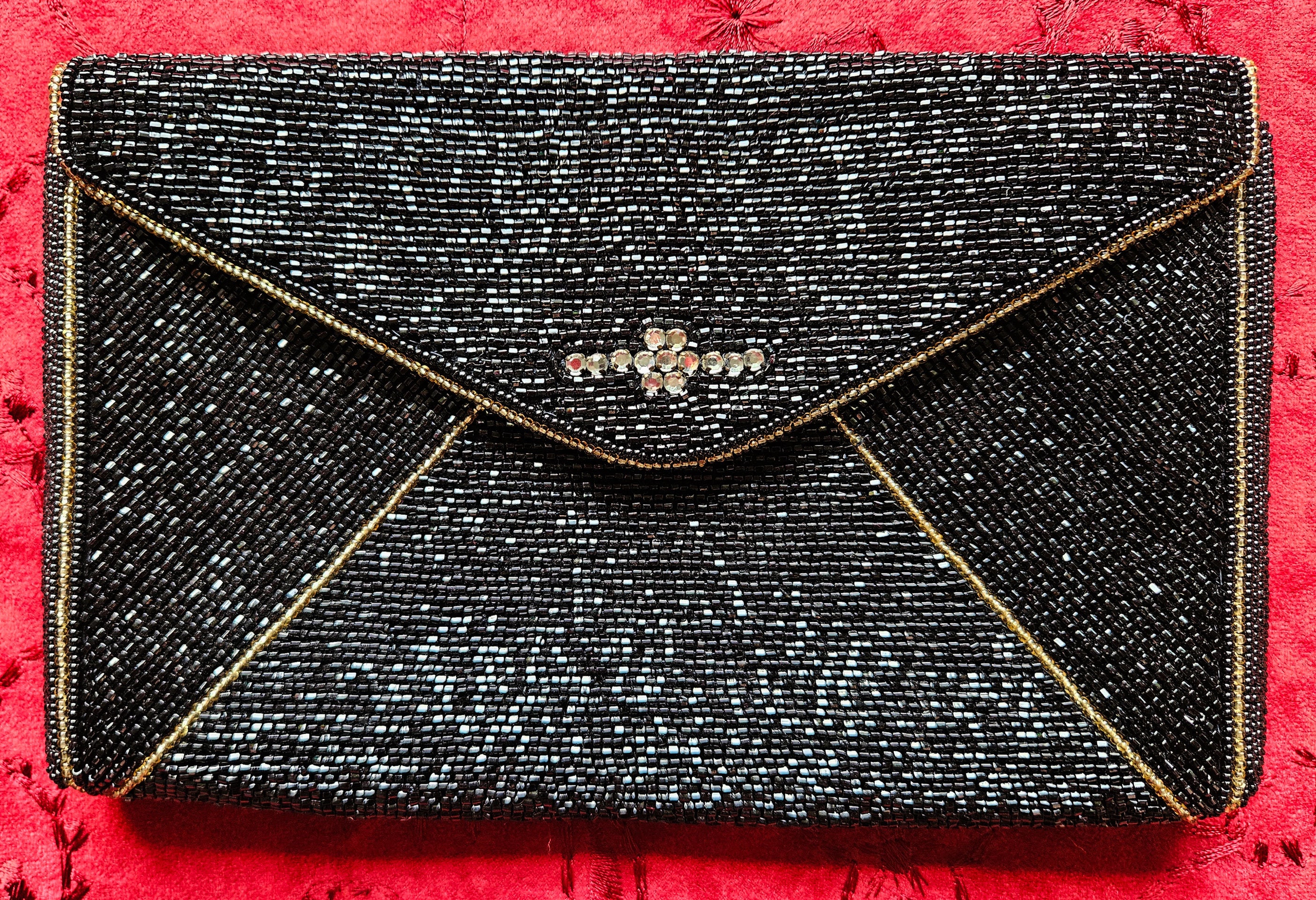 Kate spade black store envelope clutch