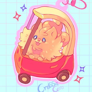 May include: A cartoon illustration of a fluffy orange dog in a red and yellow toy car. The dog has blue eyes and a pink tongue sticking out. The keychain has a pink clasp and the text "Cressa Core".