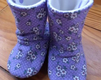 Lavender flowered Baby Booties lined with white fleece lining for your little one for the crib to keep their toes nice and warm