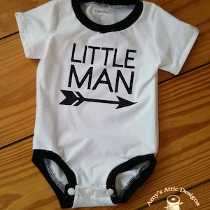 Little Man shirt in a white cotton knit with black lettering with arrow. Great Baby boy shower gift!