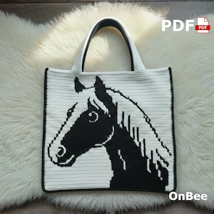 May include: A white tote bag with a black horse head design. The bag has a black border and handles. The text "PDF" and "OnBee" are visible on the bag.