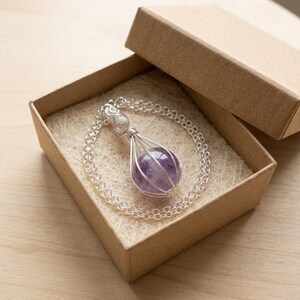 Genuine certified amethyst ball necklace with round crystal design, perfect for meditation, yoga jewelry, and spiritual gift for women.