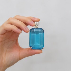 Handmade blue topaz emerald pendant necklace with step cut gemstone in silver prong setting, December birthstone jewelry gift for wife, girlfriend or mother.