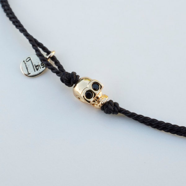 Tiny skull silk cord bracelet - adjustable bracelet - mini skull charm - black eyes skull