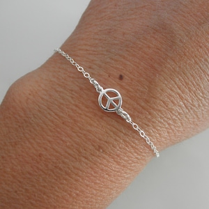 Sterling silver tiny peace sign  bracelet