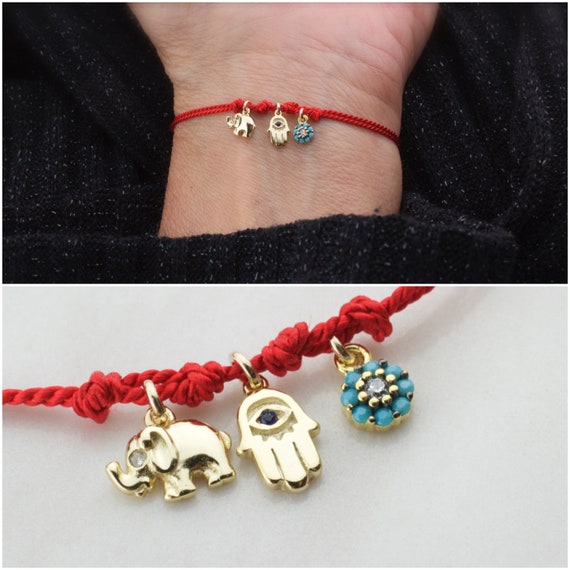 Red string bracelet shop with elephant meaning