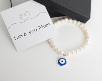 Pearl bracelet with large evil eye charm  - Stretch Pearl bracelet  - protection bracelet - white pearl stretchy bracelet - Gift for Mom -