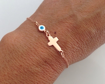 Rose gold vermeil cross bracelet with tiny evil eye