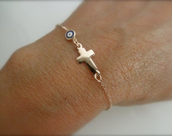 Rose gold vermeil cross bracelet with tiny blue evil eye