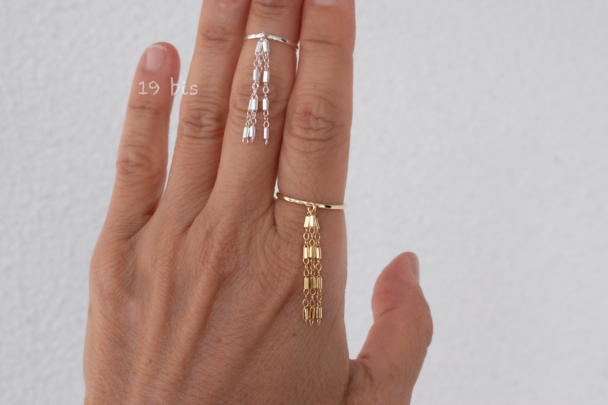 Gold tassel deals ring
