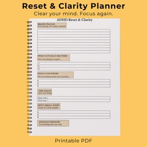 May include: A white ceramic mug with a black handle and the text "But First, Coffee" in a black, bold font. The mug is on a white surface.