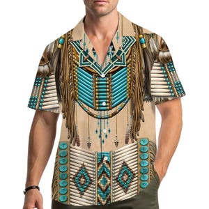 May include: Short-sleeved button-down shirt with a Native American-inspired design. The shirt features a tan background with a detailed print of turquoise beads, feathers, and geometric patterns in brown and white.