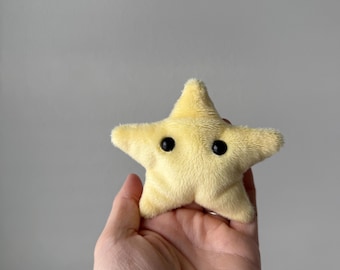 Peluche antiestrés con forma de estrella - 2 tamaños