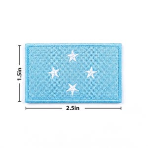 May include: A set of three ceramic mugs with a speckled, matte finish. The mugs are in cream, light grey, and dark grey. Each mug has a simple, minimalist design, ideal for coffee or tea.