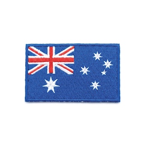 May include: A rectangular blue patch displaying the Australian flag. The design features the Union Jack in the top left, a white seven-pointed star, and five white stars representing the Southern Cross constellation.