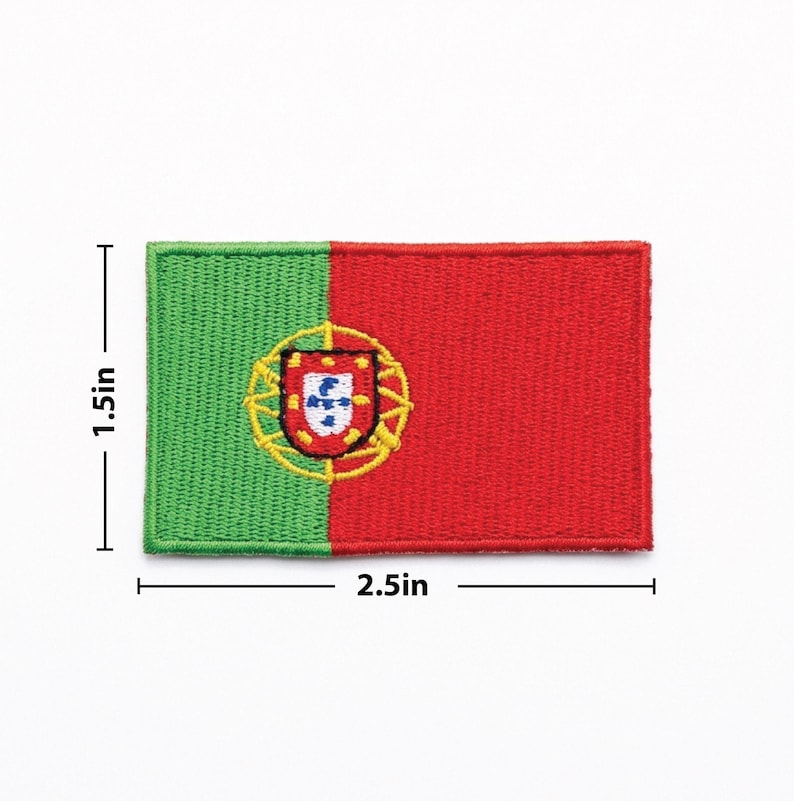 May include: Embroidered patch featuring the flag of Portugal. The rectangular patch is divided into green and red sections, with the Portuguese coat of arms in the center. The patch measures 2.5 inches wide and 1.5 inches high.