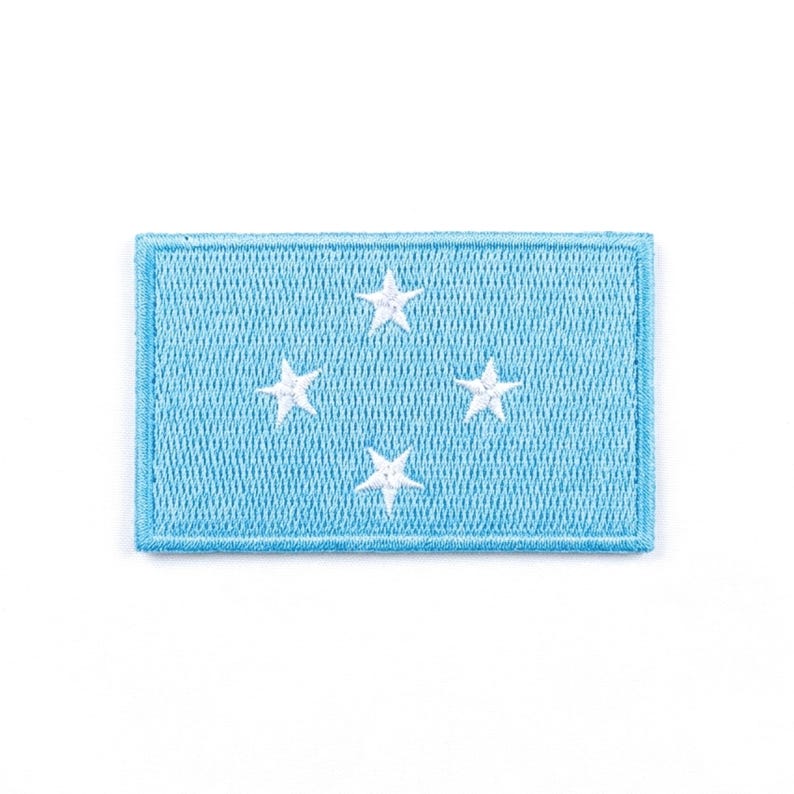 May include: A distressed wooden sign with the words "Welcome to our home" in white. The sign has a rustic finish and a simple design, ideal for a welcoming entryway.