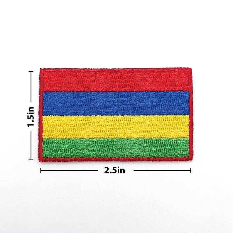 May include: A rectangular embroidered patch featuring horizontal stripes of red, blue, yellow, and green. The patch measures 2.5 inches wide and 1.5 inches high. The edges are neatly finished with a red border. This patch is suitable for clothing or accessories.