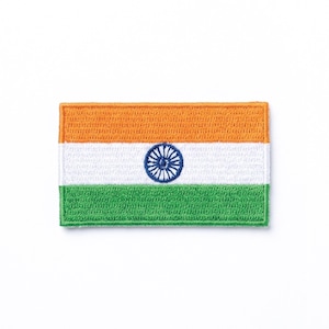 May include: Embroidered patch depicting the Indian flag. The rectangular patch shows the flag's tricolour design: an orange top band, a white middle band with a blue wheel, and a green bottom band. The patch has a white border.