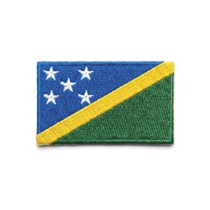 May include: Embroidered patch featuring the flag of the Solomon Islands. The design includes a blue rectangle with five white stars, a yellow diagonal stripe, and a green triangle. The patch is rectangular.