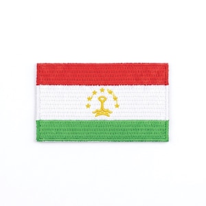 May include: Embroidered patch of the Tajikistan flag. The rectangular patch has red, white, and green horizontal stripes. A gold emblem with seven stars is in the centre of the white stripe. The patch is likely for clothing or accessories.