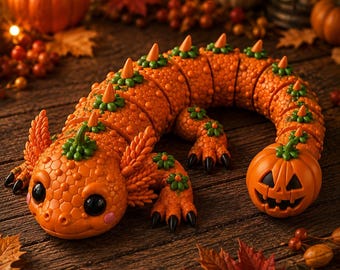 May include: An orange articulated axolotl figure with a textured, honeycomb-like skin pattern. The creature features green pumpkin-stem accents along its back, small orange spikes, and a carved jack-o'-lantern pumpkin head at the end of its tail.