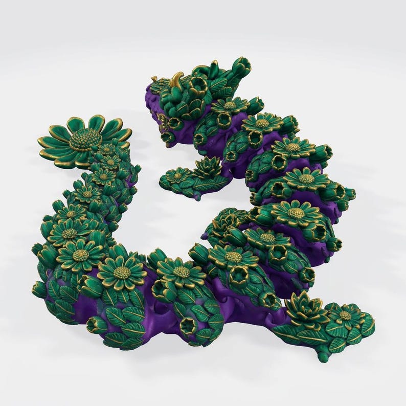 May include: A decorative sculpture in the shape of a stylized floral form. The sculpture features a vibrant color palette of green, gold, and purple. The design incorporates numerous flower and leaf elements, creating a whimsical and artistic aesthetic.