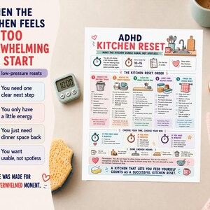 May include: A printed kitchen reset guide with the text "ADHD Kitchen Reset" and "When the Kitchen Feels Too Overwhelming to Start." Includes a timer, sponge, and a cup of coffee. The guide offers steps for kitchen organization.