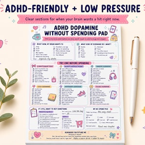 May include: A white paper notepad titled ADHD DOPAMINE WITHOUT SPENDING PAD with colorful text, checkboxes, and illustrations. The page includes sections for brain treats, dopamine categories, and a no-spend checklist with handwritten notes.