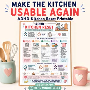 May include: A colorful ADHD Kitchen Reset printable on a clipboard, with a pink heart-shaped mug and a light blue utensil holder with wooden spoons and a whisk. The text reads "Make the Kitchen Usable Again".