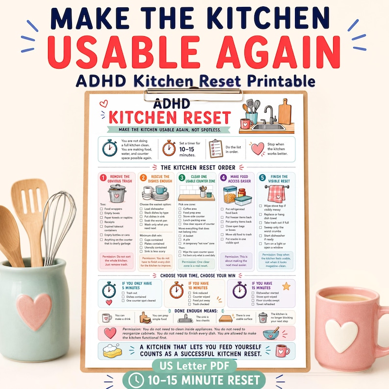 May include: A colorful ADHD Kitchen Reset printable on a clipboard, with a pink heart-shaped mug and a light blue utensil holder with wooden spoons and a whisk. The text reads "Make the Kitchen Usable Again".