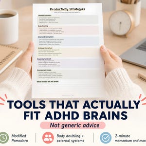 May include: A person holding a white paper titled "Productivity Strategies" with text and coloured blocks. The paper is on a wooden desk with a coffee mug, notebook, clock, and laptop. The text reads "TOOLS THAT ACTUALLY FIT ADHD BRAINS."