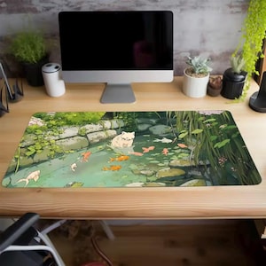 Può includere: Un set di tre tazze in ceramica con finitura opaca e macchiettata. Le tazze sono nei toni del crema, grigio chiaro e grigio scuro. Ogni tazza ha un design semplice e minimalista.