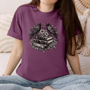 Bookstack Illustration T‑Shirt: Gothic Reader Shirt, Dark Academia Tee, Raven Graphic Tee