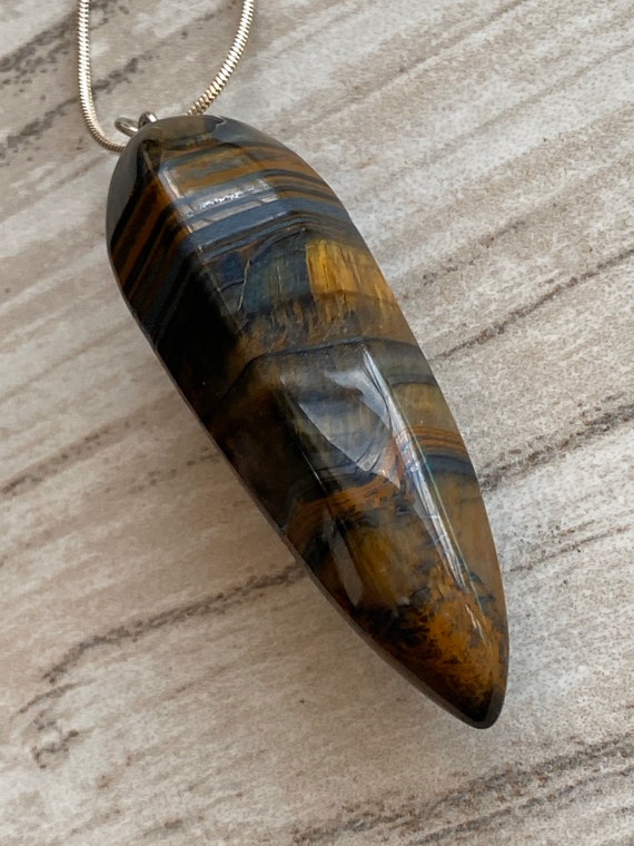 Natural “Tiger Eye” polish Pendant. Handcrafted