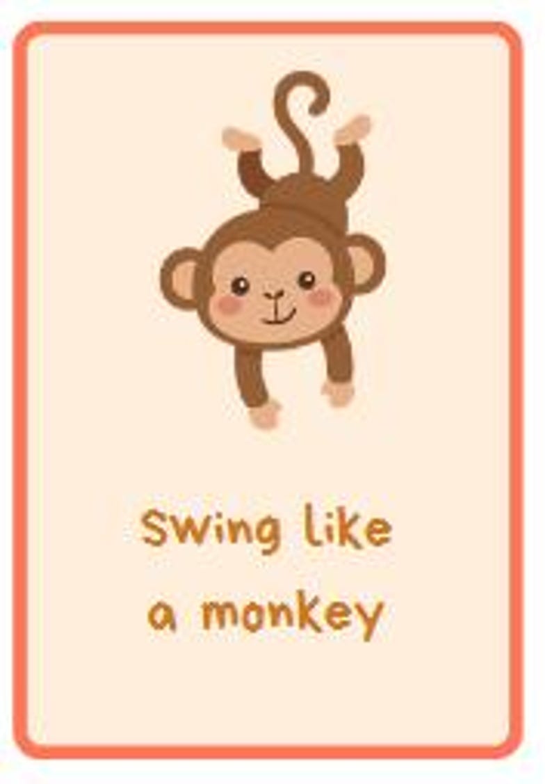 May include: A rectangular card with a cartoon monkey illustration. The monkey is brown with a light brown face and is hanging upside down. The text "swing like a monkey" is below the illustration. The card has an orange border.
