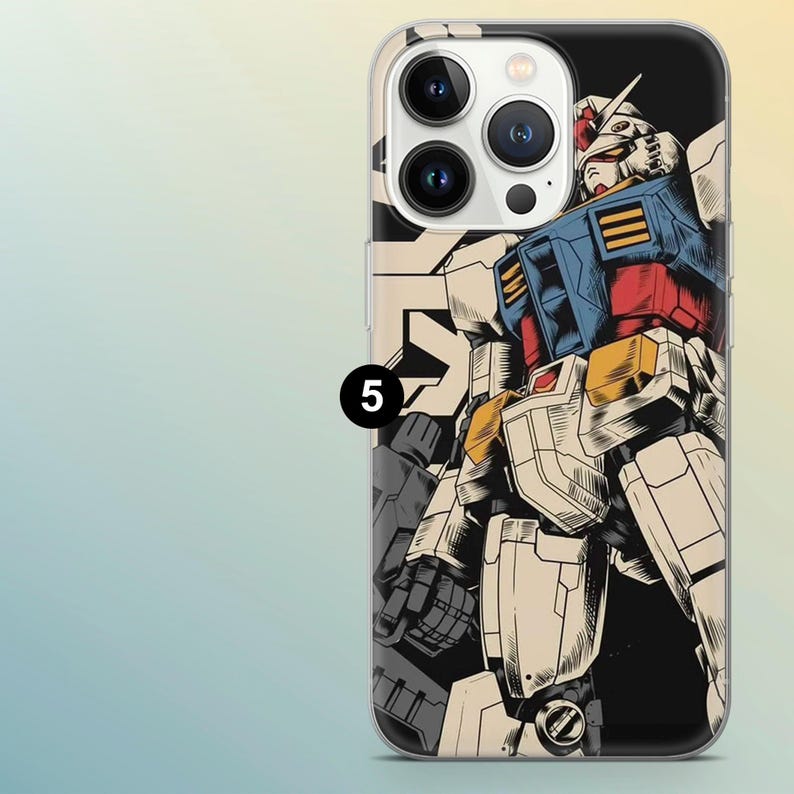 May include: A clear phone case with a detailed illustration of a robot in white, blue, red, and yellow. The robot is set against a black background. The number "5" is printed on the side of the case.