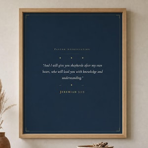 Jeremiah 3:15 Shepherds After My Own Heart modern minimalist scripture print framed in light oak on a sage green linen wall, dried eucalyptus in ceramic vase on console, soft natural daylight, pastor appreciation christian wall art digital download from TheFramedVerse on Etsy, pastoral gifts for church leader